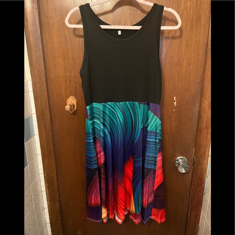 Black & Multicolored swirl pattered dress with color-block effect. Knee length.